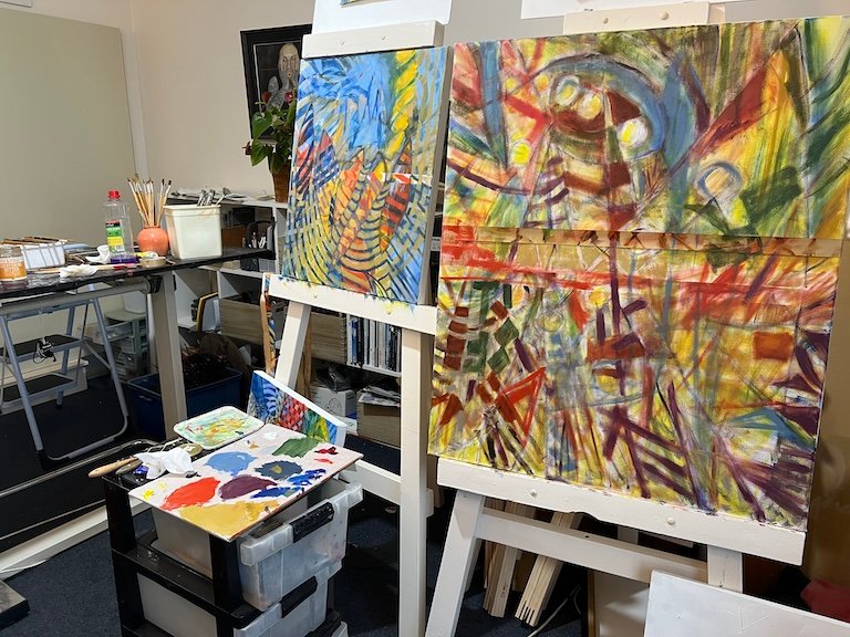 How my year-long art challenge changed me. Artwork in progress on easels.